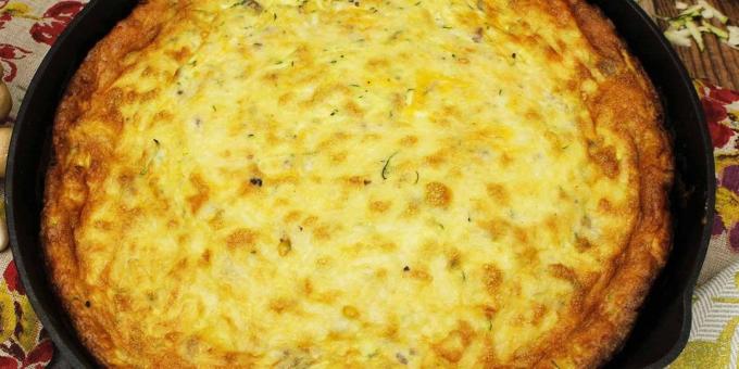 Zucchini dalam resep oven: Telur casserole dengan zucchini, keju dan rempah-rempah