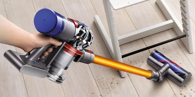 Bagaimana memilih vacuum cleaner: Tegak vacuum cleaner dengan motor dan kolektor debu dalam menangani