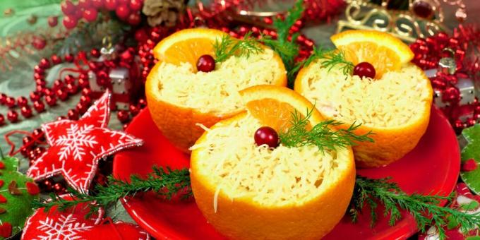 Salad keju dengan stik kepiting berwarna oranye: resep untuk salad Tahun Baru