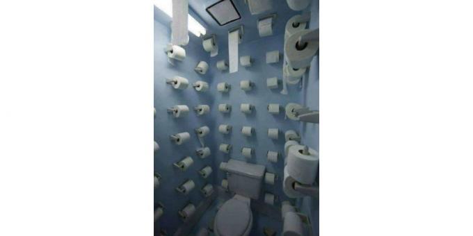 desain toilet: kertas di dinding