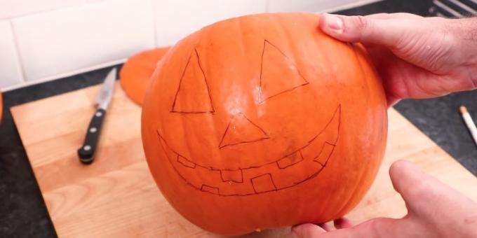 Halloween labu dengan tangannya sendiri: menggambar wajah