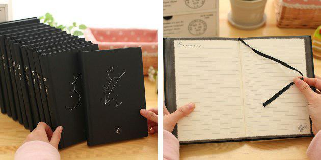 Notebook dengan tanda-tanda zodiak
